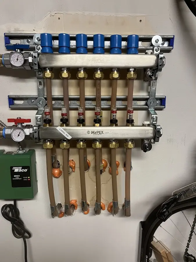 Plumber performing Gas Line Installation at a residential property in Eden Prairie